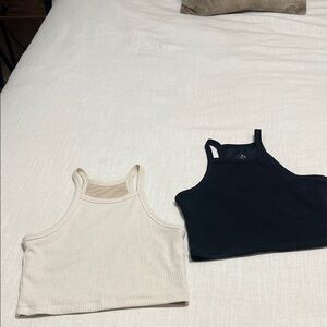 Cream and black high neck crop tanks with built in bra support